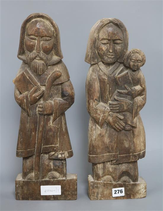 A pair of oak carvings length 46.5cm